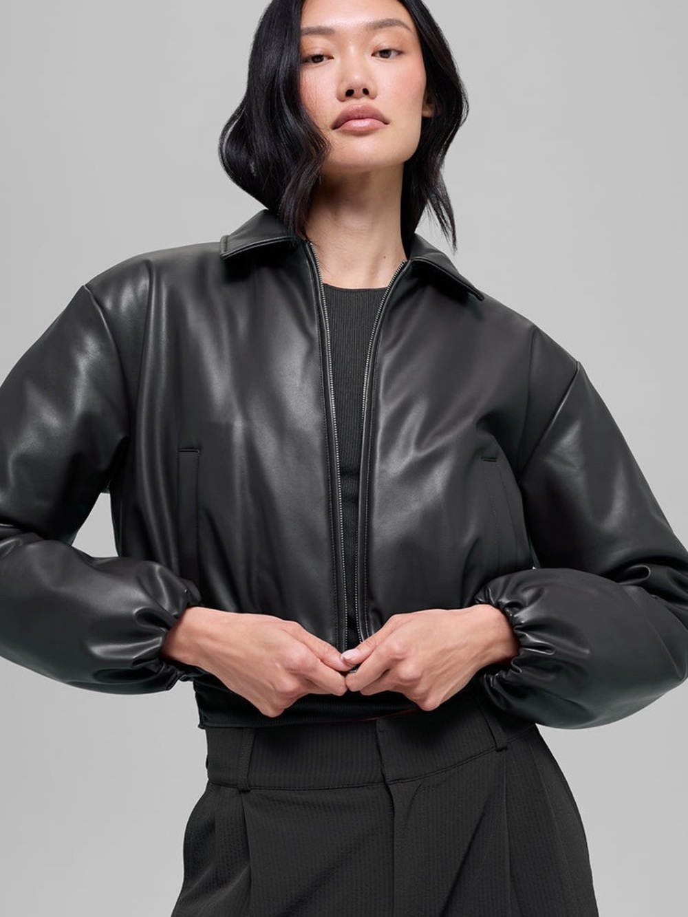 Alo Yoga Faux Leather Cropped Premier Bomber in Black